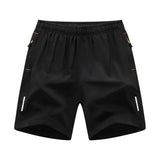 Short de sport homme | Short de running léger avec poches zippées